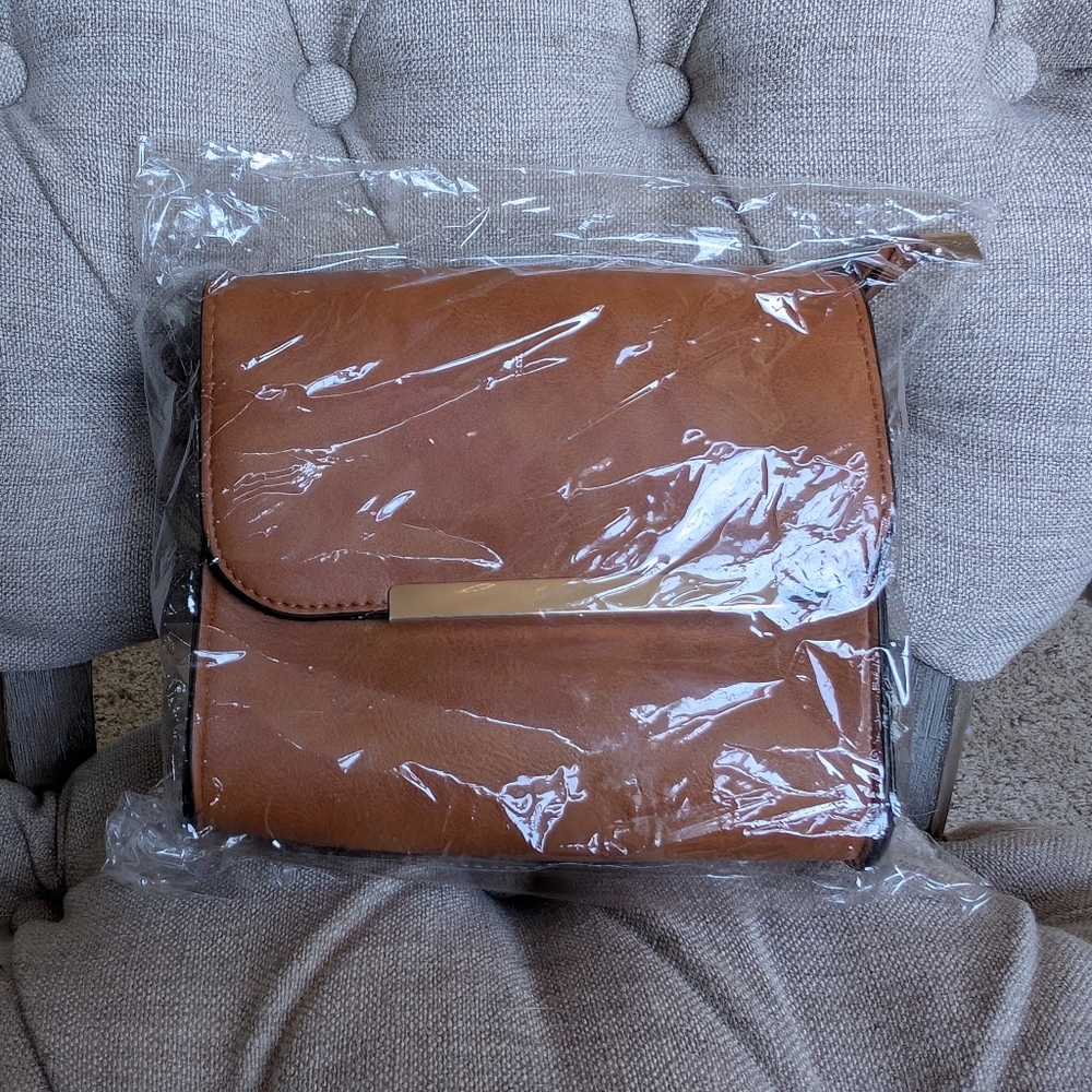 Karma small tan crossbody bag